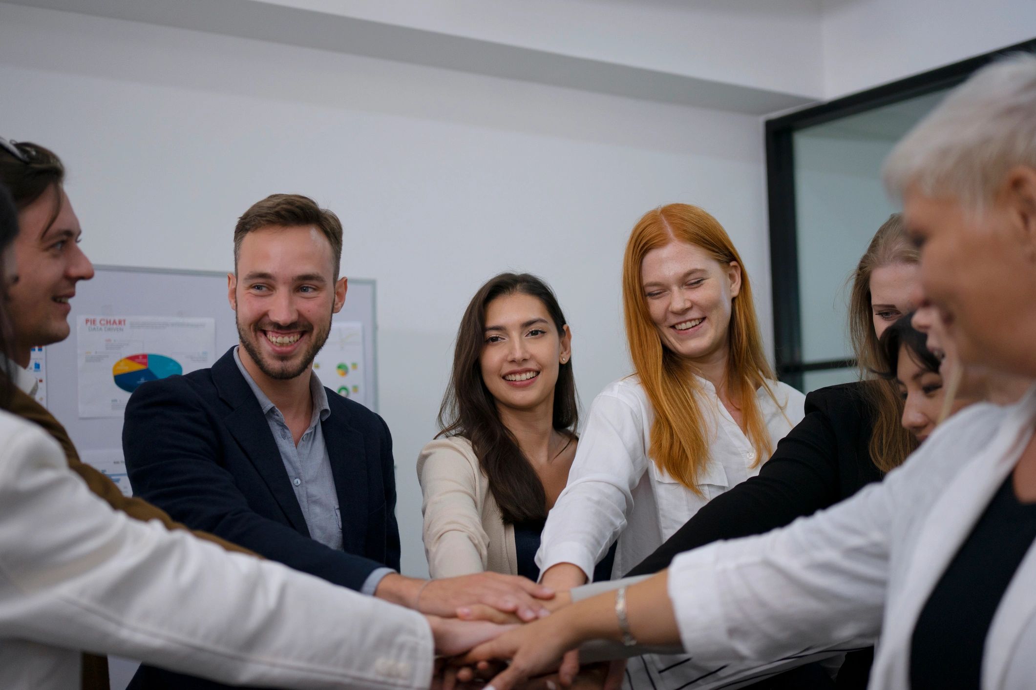 Healthcare revenue cycle team collaborating in office